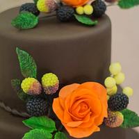 Wedding cake with berries & roses
