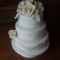 Pearls and Lace in ivory and white with handmade fondant roses 
