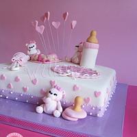 Christening cake with baby and bears