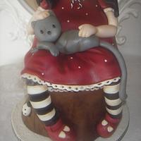 Sculpted cake of Santoro's Gorjuss doll 