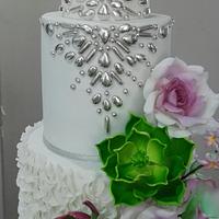 Wedding cake with succulents and roses