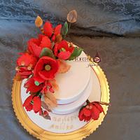 Birthday cake with wild poppies