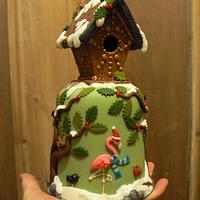 Mini Christmas cake with gingerbread birdhouse, for a bird lover.
