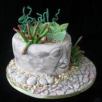 Stone flowerpot with succulents