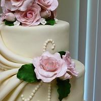 Delicate Beige with pink roses wedding cake