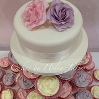 Pink, lilac, and cream roses 
