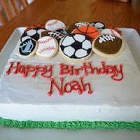 Sports theme birthday cake with cookie toppers