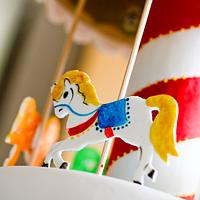 spinning carousel cake with lights