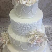 Vintage Inspired lace and pearl wedding cake