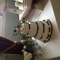 Malteaser & white roses wedding cake 