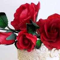 Roses, pearls and ruffles wedding cake