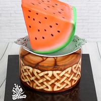 watermelon & carved wood