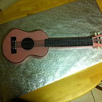 Pink guitar.