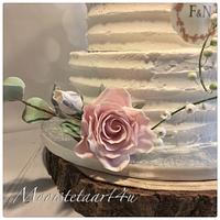 Weddingcake with roses of cold porselain...