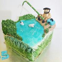 Fishing theme cake and edible discus crispy treat 