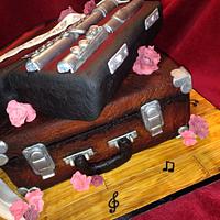 Flute and clarinet case cake