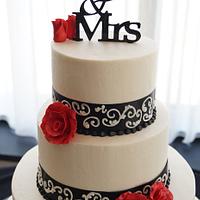 Ivory, red, and black wedding cake