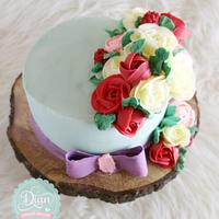 Ribbon bow and flower butter cream cake