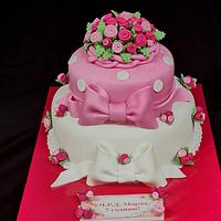 Cake with ribbons and flowers
