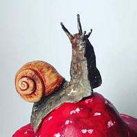 Snail on mushroom cake 