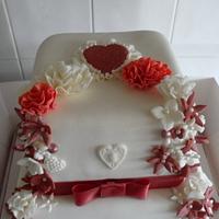 FLOWERY RED WEDDING CAKE