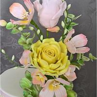 Wedding cake with sugar bouquet
