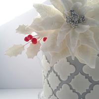 Fantasy poinsettia and quaterfoil pattern Christmas cake