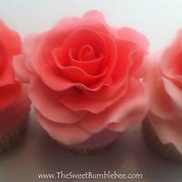 Cupcakes topped with hand-made Sugar Roses