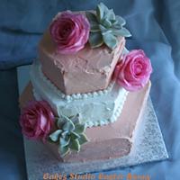 Roses and succulent wedding cake