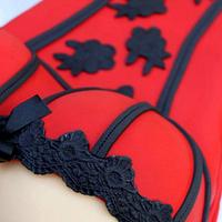 red and black lace corset cake 