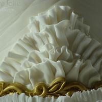 White and Gold Ruffled Wedding Cake