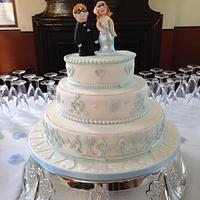 wedding cake with custom bride and groom topper 