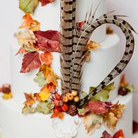 Pheasant feathers and falling leaves