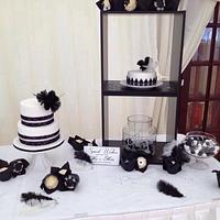 Black and white feather dessert table 