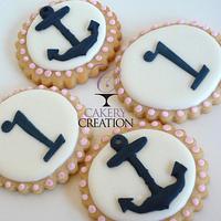 Pink and navy nautical cake and cookies to match invites