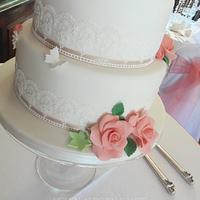 Coral and lace birdcage wedding cake 