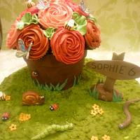In the garden. Chocolate flower pot and cupcake roses.