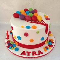 Balloons and buttons cake