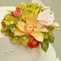 Exotic orchids and coral wedding cake