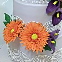 Gerbera and lily wedding cake