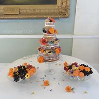 Naked wedding cake with edible flowers