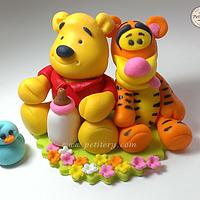 Baby Winnie the pooh cake topper - cake by Petitery cakes - CakesDecor