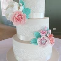 Ivory tiers with pastel blooms...