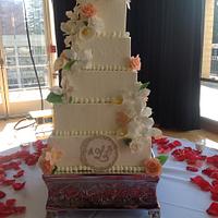 PEACHY WHITE WEDDING CAKE