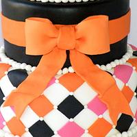 Orange, pink and black cake
