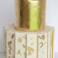 Gold leafing and white chocolate panels cake