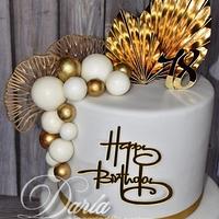 white and gold leaf cake