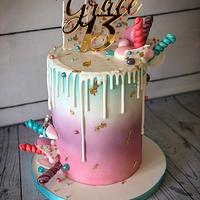 Pastel drip cake with gold accents