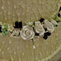 Rain buttercream wedding cake w/ gumpaste flowers