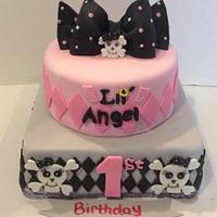 1st birthday pink and black skull cake
